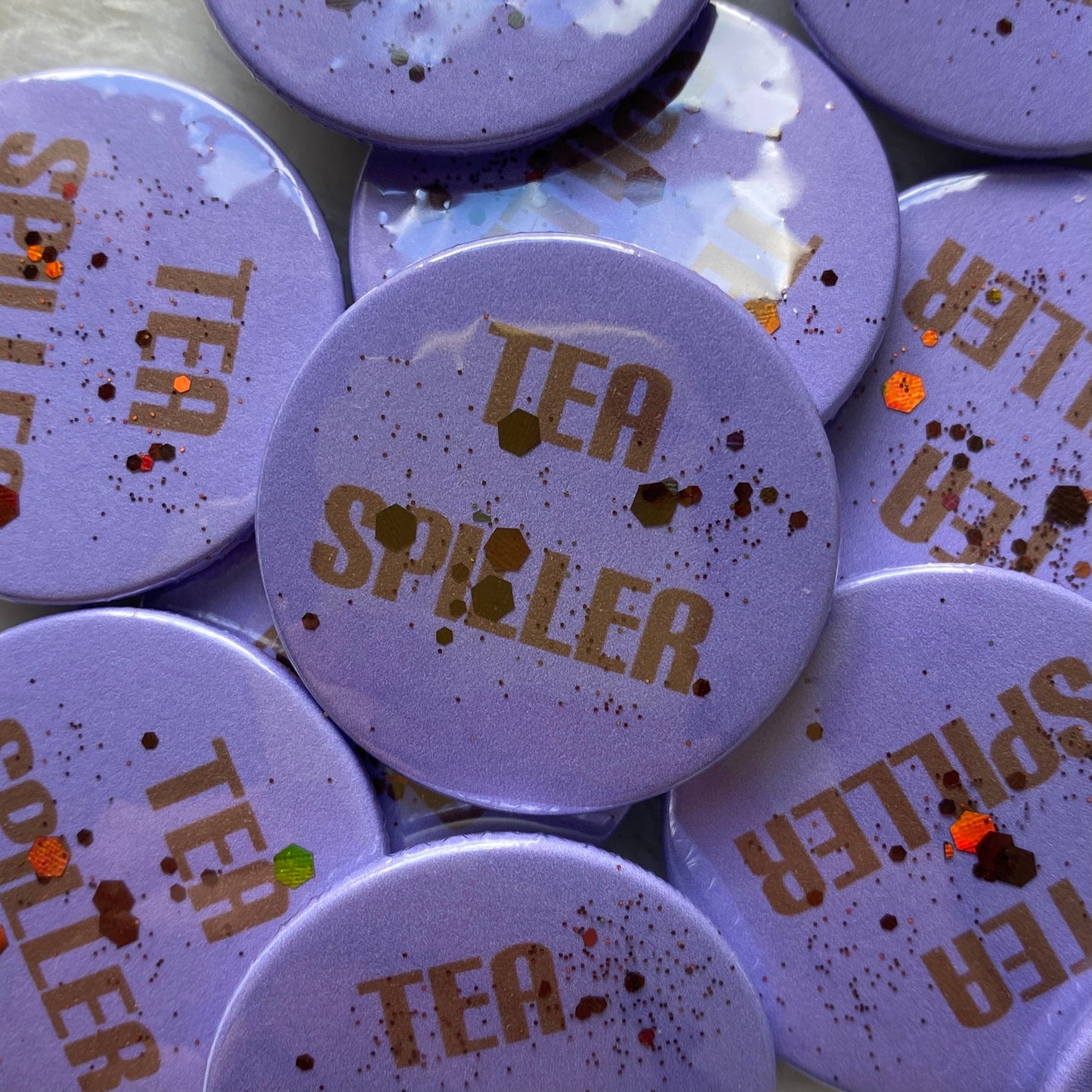 Tea Spiller Glitter Badge 38mm